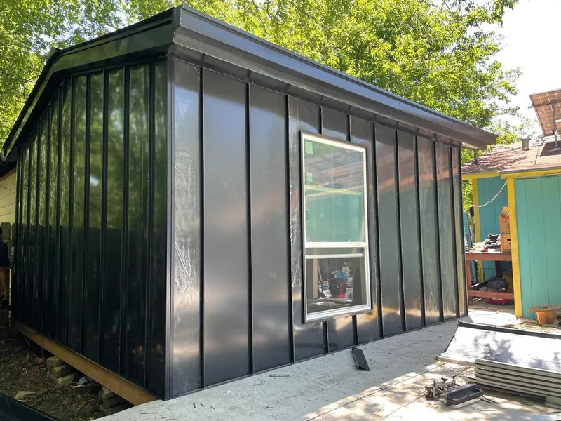 Black standing seam metal wall panels for Roof Inspection in Daytona Beach Shores